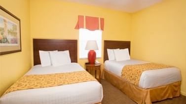 Two Full Beds in 2-Bedroom 2-Bath Ada Suite with Roll in Shower at Lake Buena Vista Resort Village & Spa