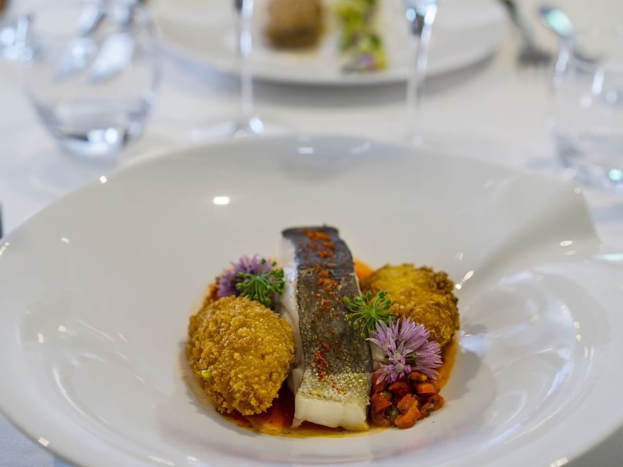 Closeup of a warm dish at  Hotel le pillebois