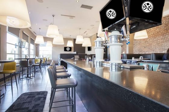 bar and seating at the rockford in the sandman signature hotel in prince george 