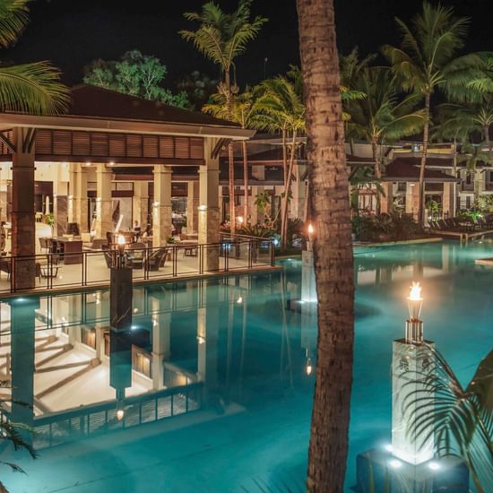 Aluca Restaurant overlooks the beautiful lagoon pool at Pullman Port Douglas Sea Temple Resort & Spa