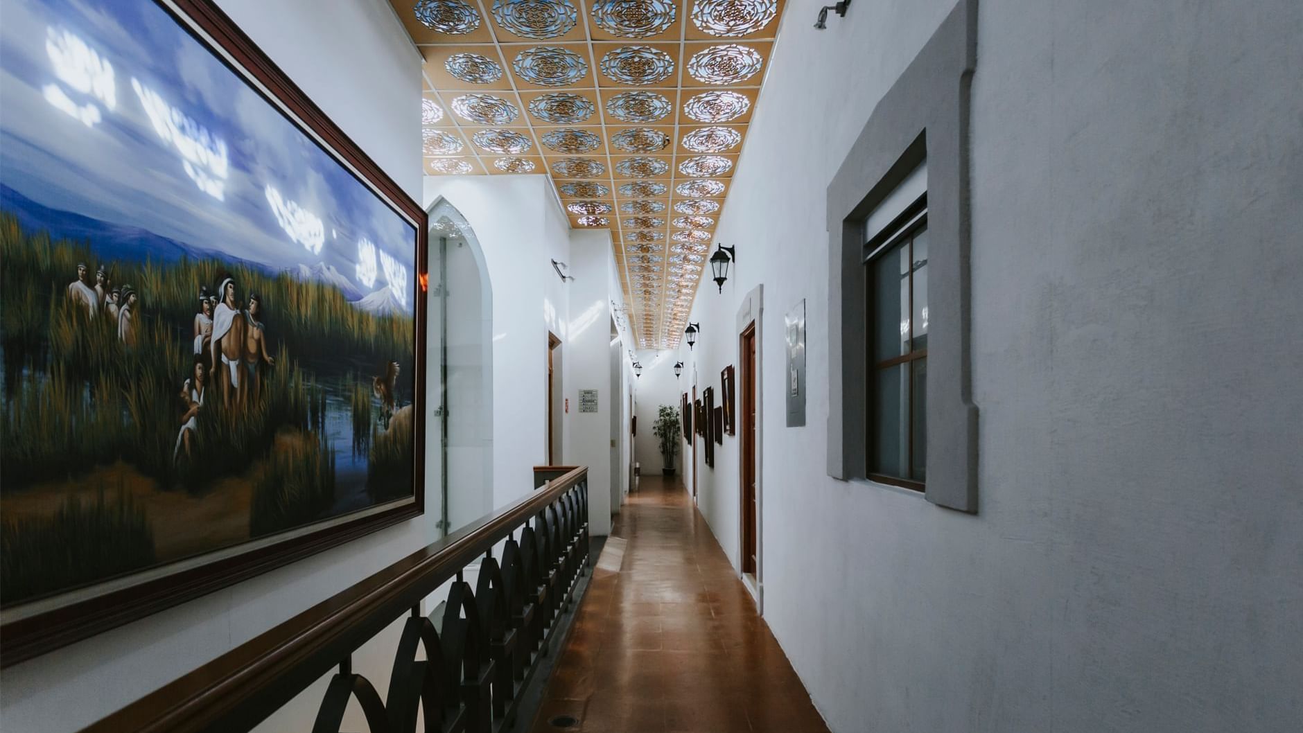 Paintings in the passage area of Dos Patios Queretaro Curamoria