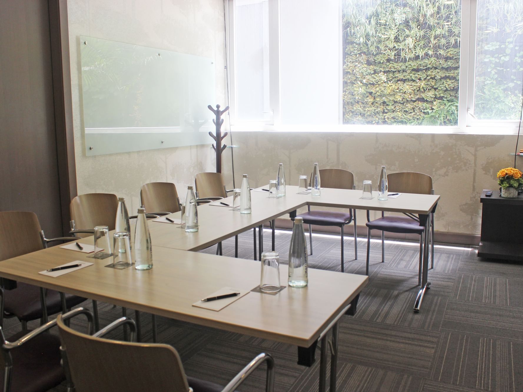 U-shaped table arranged in a meeting room at Blue Doors Hotels