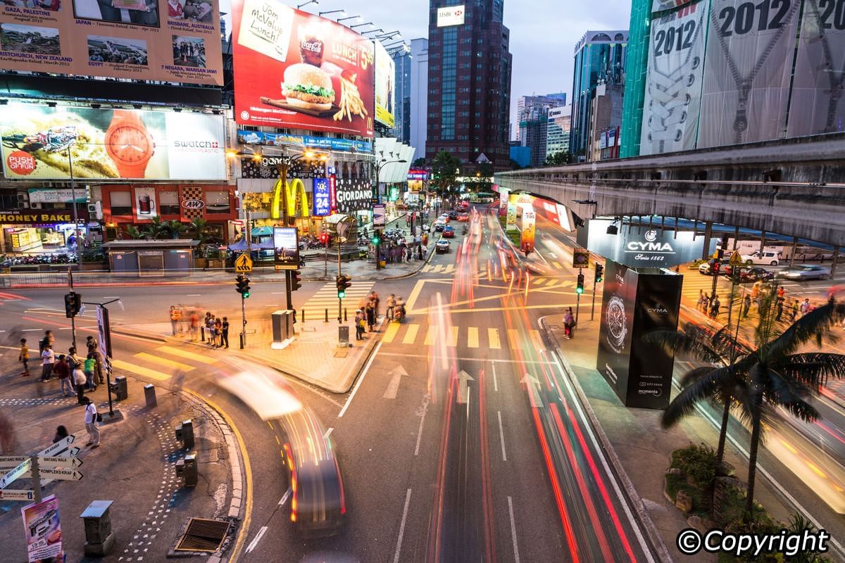 Bukit Bintang with cars and billboards near Sunway Resort