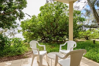 A porch with chairs in Beachside Suite at Heron Island Resort
