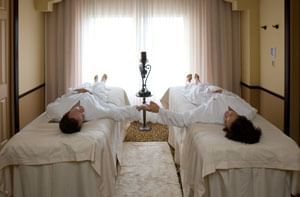 Couple relaxing in Reflections Spa & Salon at Lake Buena Vista Resort Village & Spa