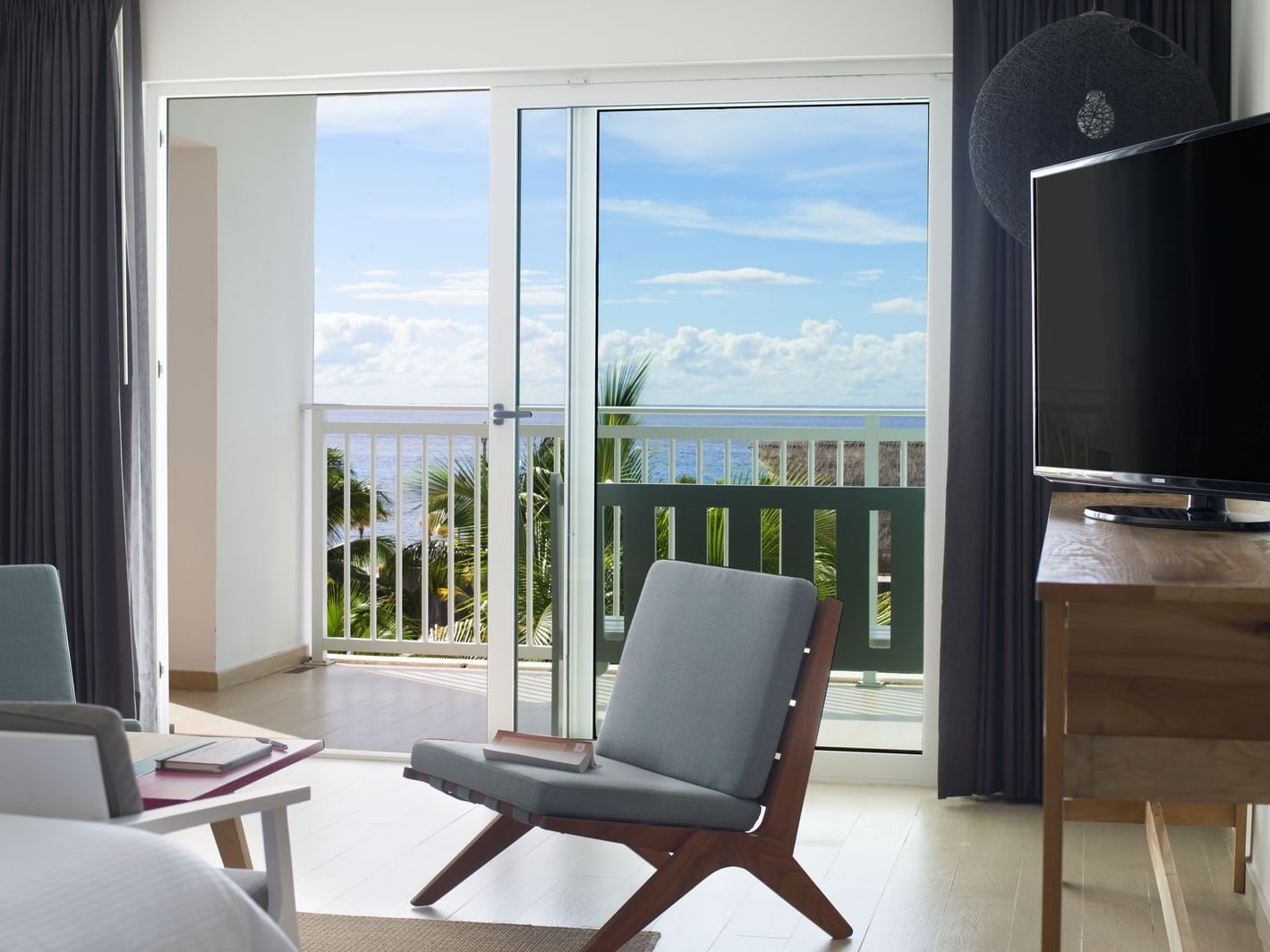 Master suite 1 king sitting area at La Colección Resorts