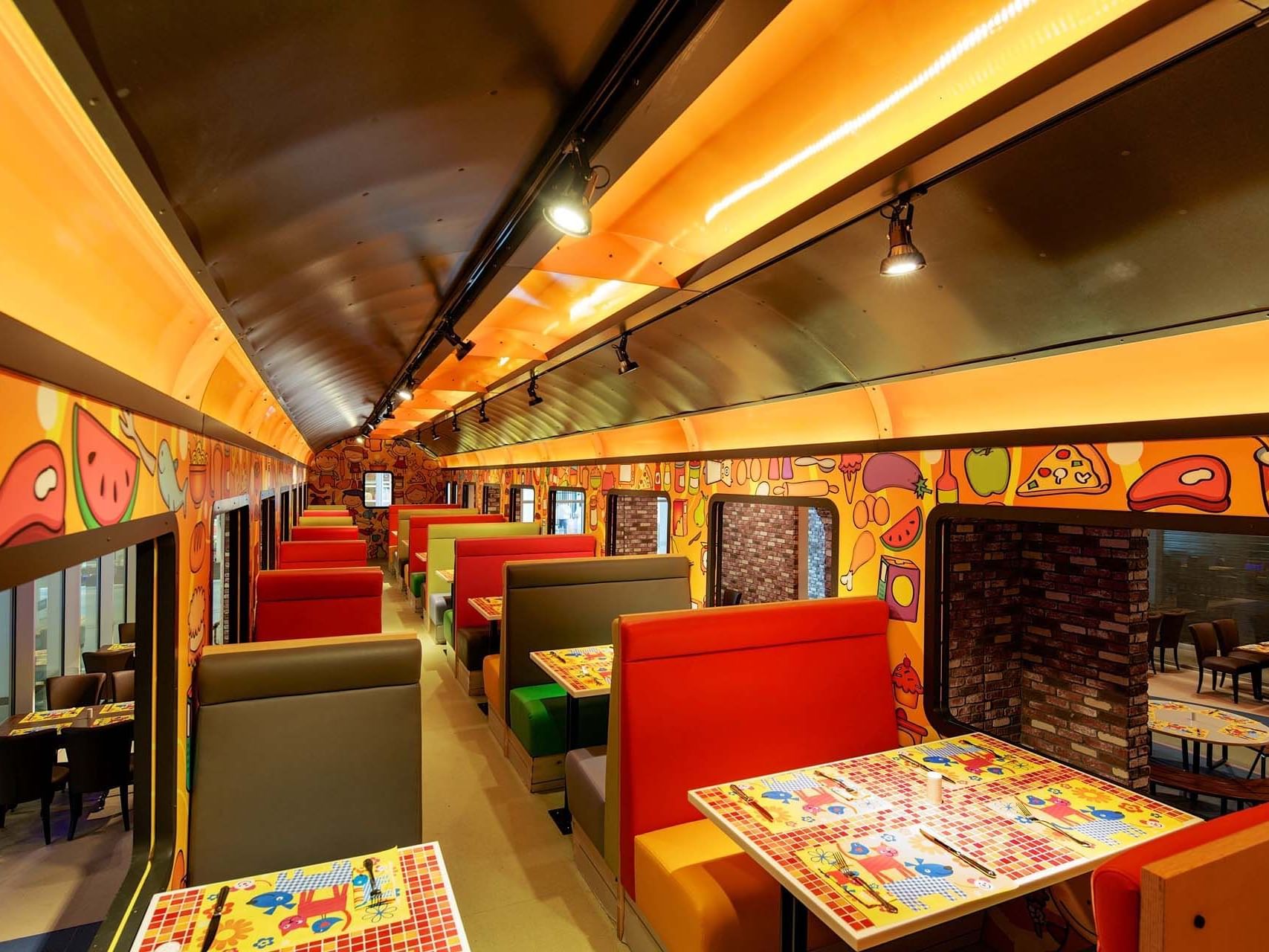 Train-themed dining area of Tini Kids Restaurant at Titanic Deluxe Golf Belek