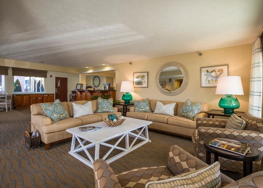 Caperted living room with sofas at Juniper Hill Inn by Ogunquit Collection