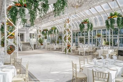 Spacious Conservatory with dining area at The Madison Hotel