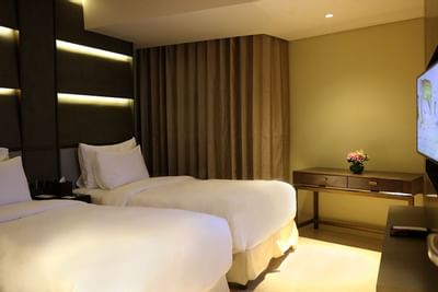 Three Bedroom Apartment with twin beds at Vasa Hotel Surabaya