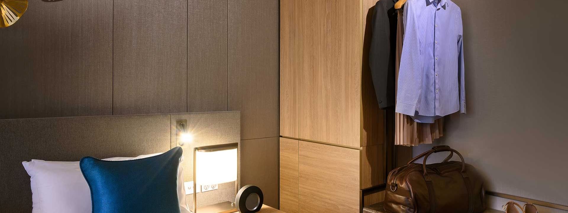 Hanged shirts, bag in Superior Room at Melbourne Central Hotels