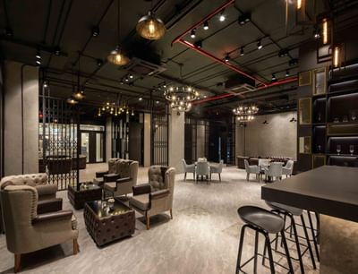 Comfy chairs in The Lounge & Terrace with a warm embrace at Eastin Vientiane Laos