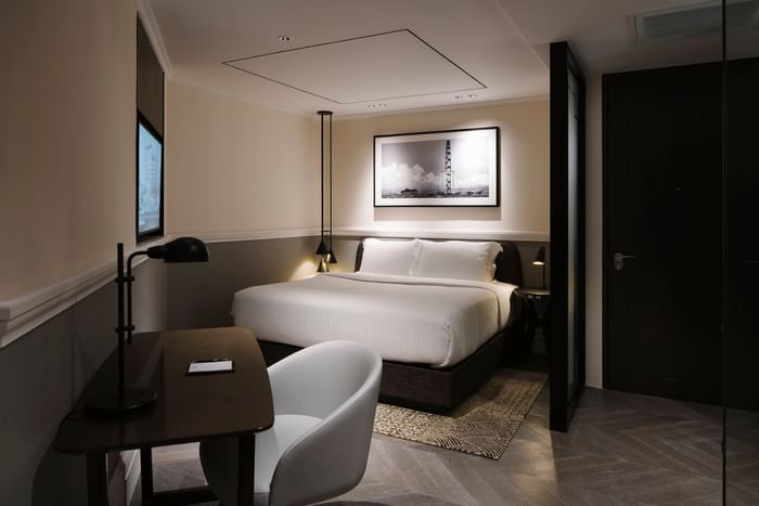 Work desk facing the king bed in Junior Suite at Grand Park City Hall