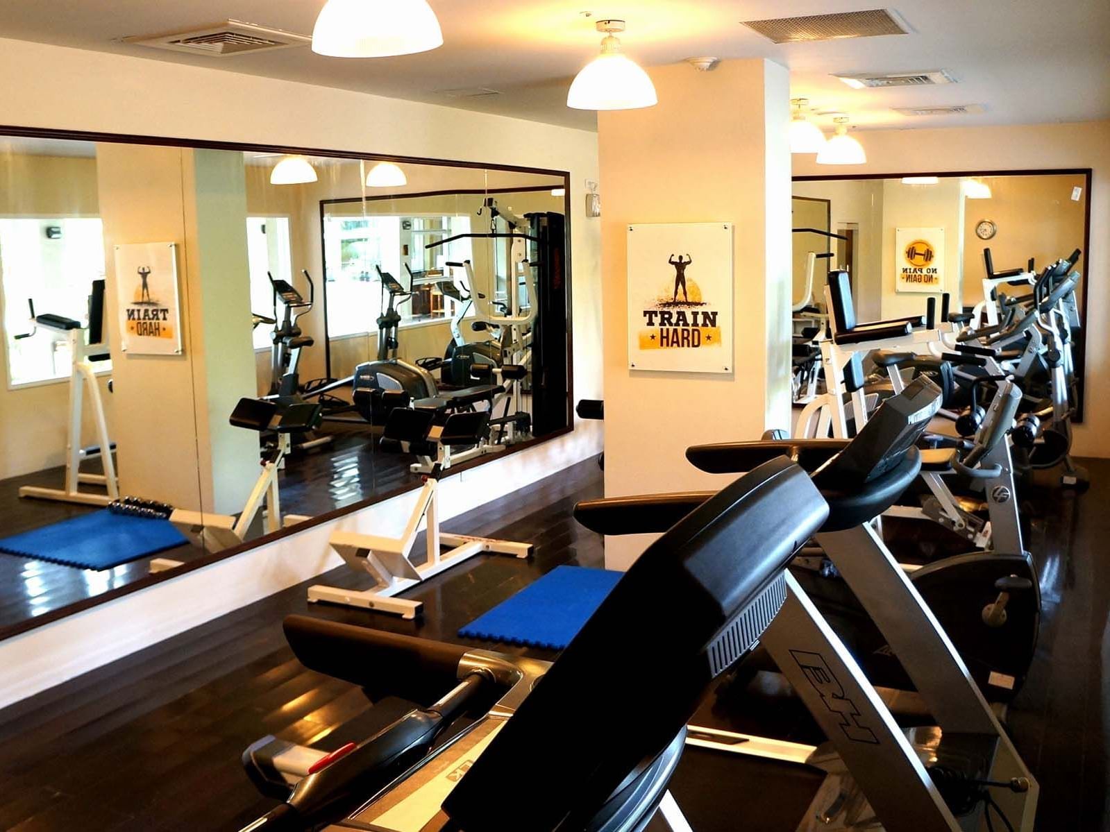 Interior of the equipped fitness center at Palau Royal Resort