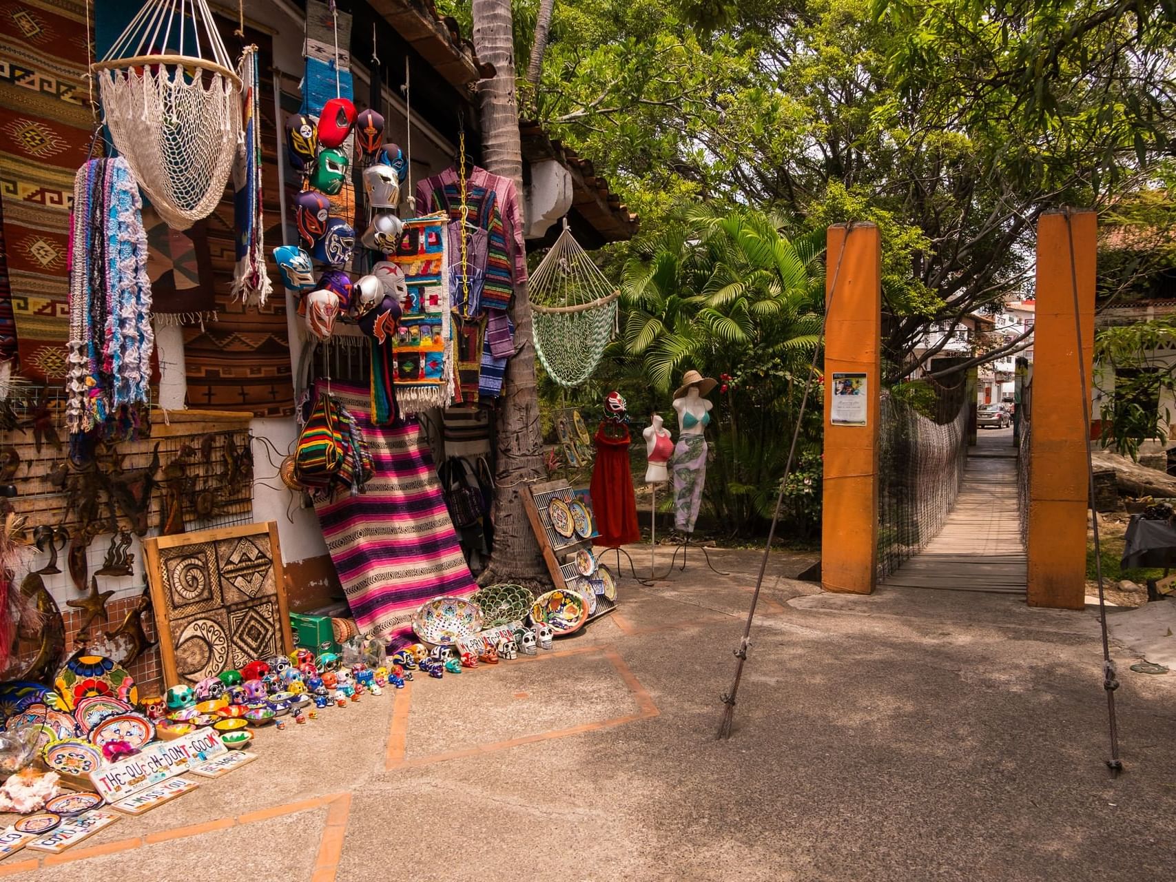 Pottery and embroidered clothing items in Isla Cuale Flea Market near Buenaventura Grand Hotel and Spa