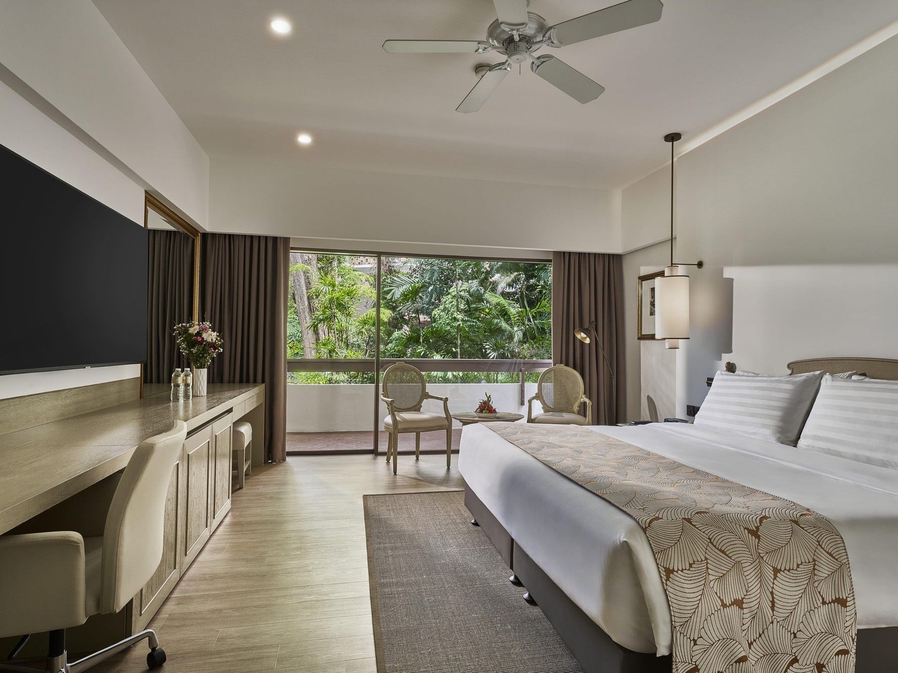 Bedroom area in Deluxe Mayfair Room at Goodwood Park Hotel