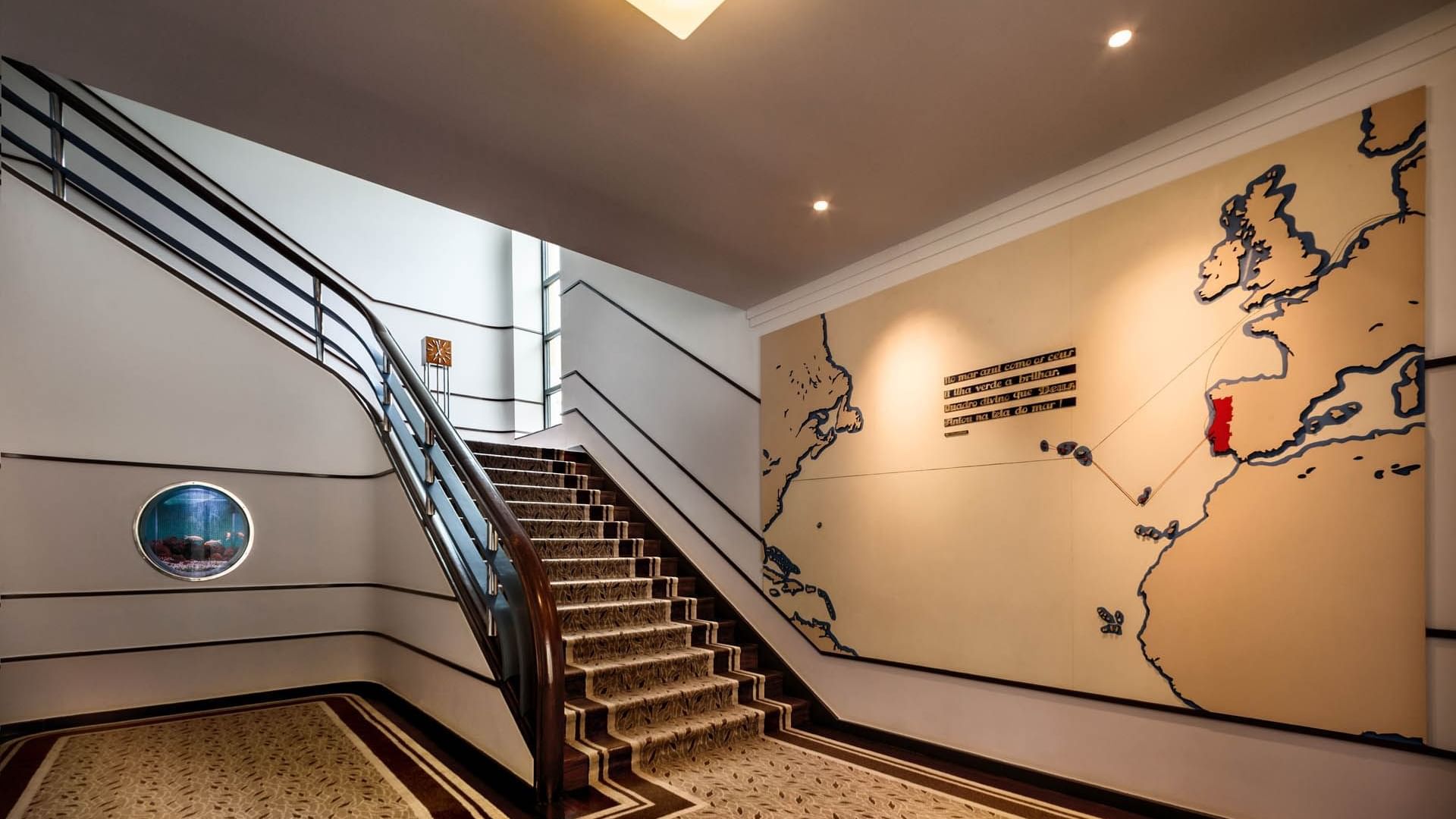 Wall map by the stairs at Bensaude Hotels Collection