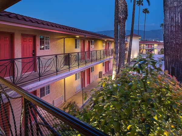 Exterior of Safari Inn, a Coast Hotel at night