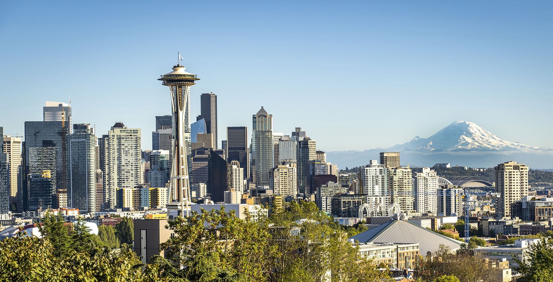 view of downtown seattle skyline with mt rainier 