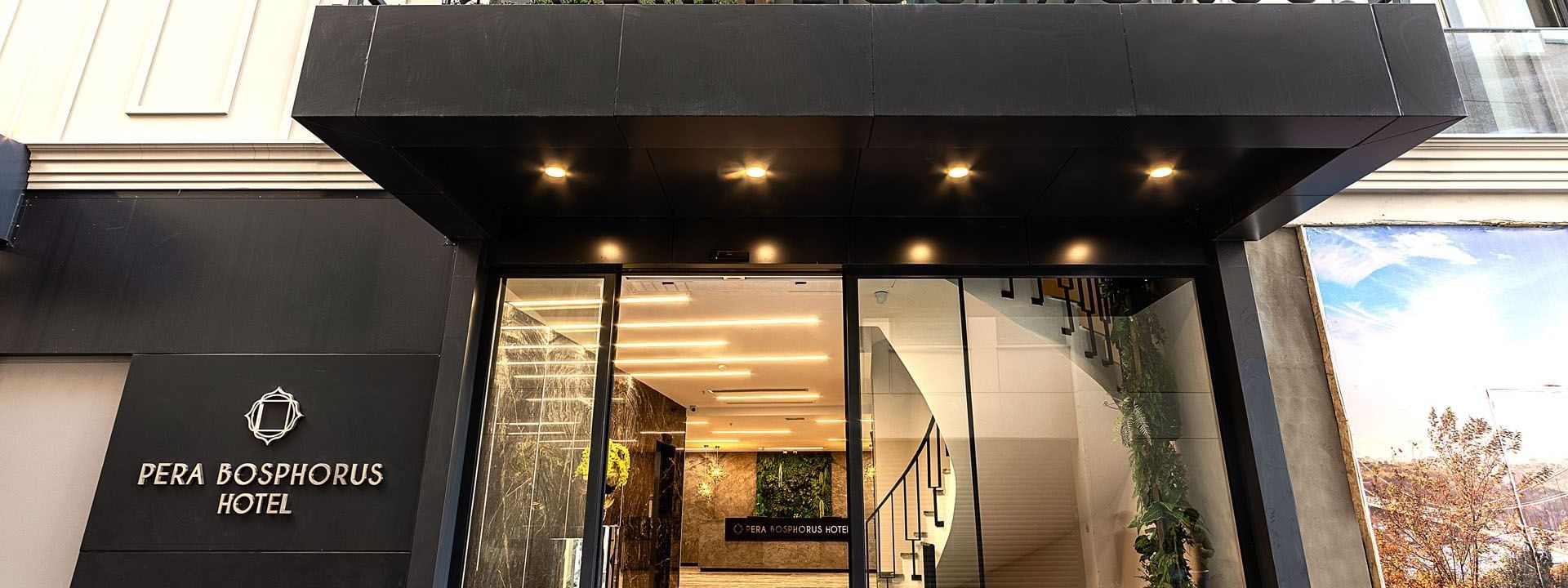 Front view with entrance sign of Pera Bosphorus Hotel