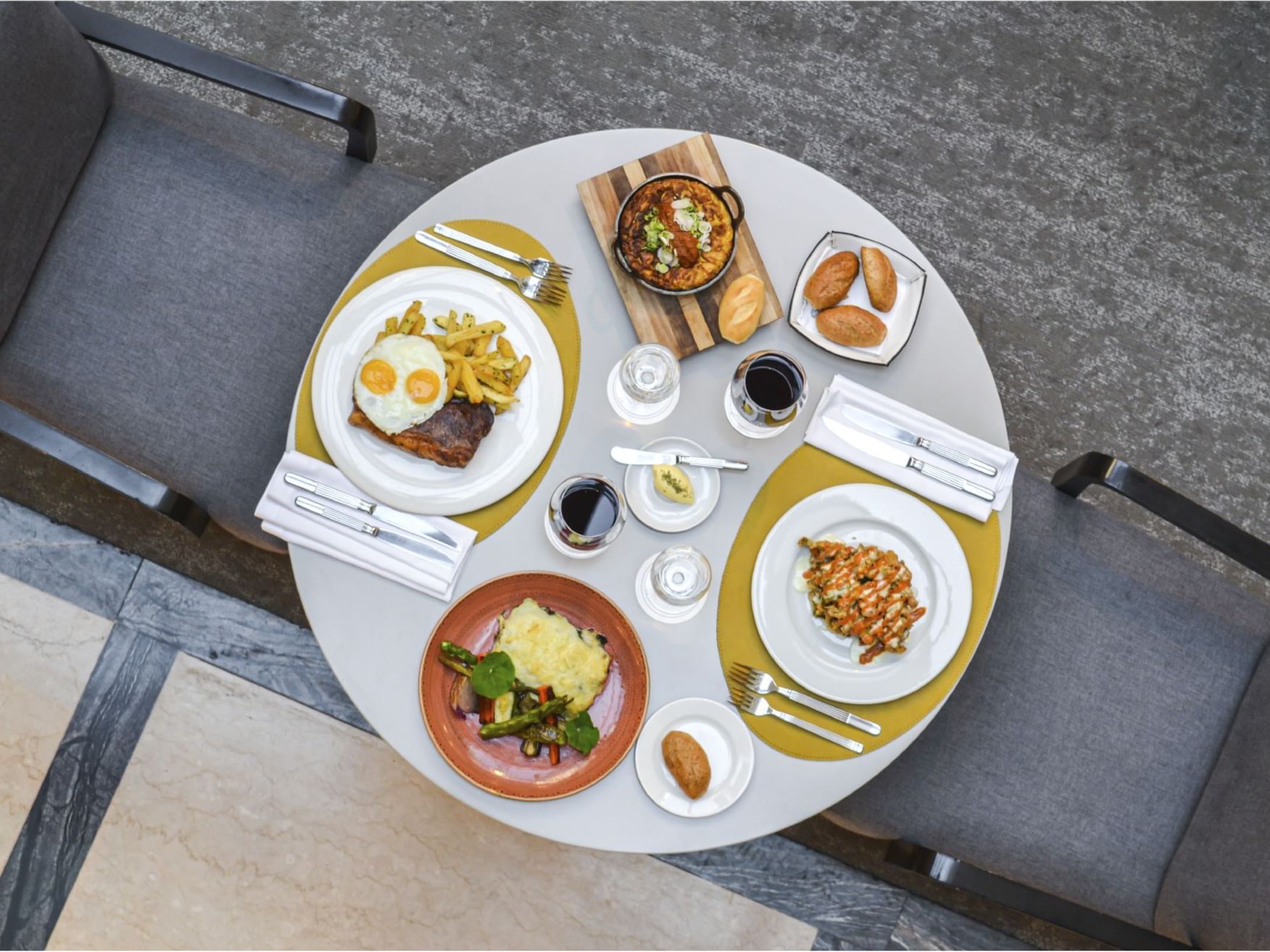 Close up of cuisines served on a table at Recoleta Grand Hotel