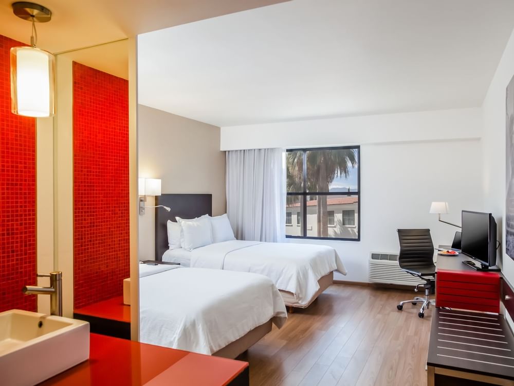 Double beds in Executive Room with TV at Fiesta Inn