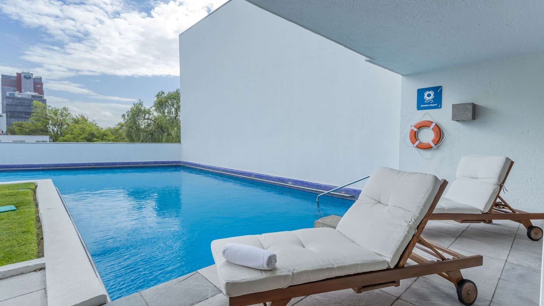 King Presidential Suite private terrace pool with a white lounge chair and clear blue water at Camino Real Polanco Mexico