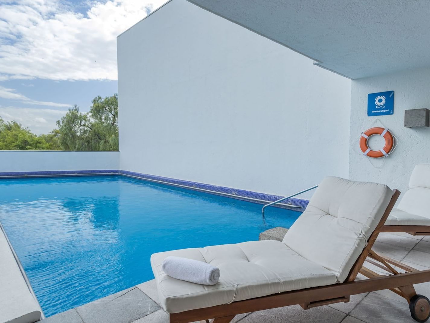King Presidential Suite private terrace pool with a white lounge chair and clear blue water at Camino Real Polanco Mexico