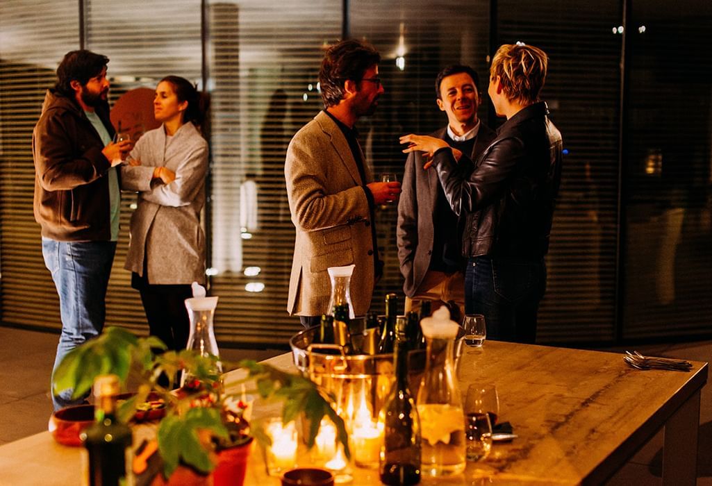 guests talking in intimate setting during a corporate event