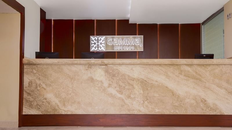 Close-up of Reception counter in lobby at Gamma Tampico