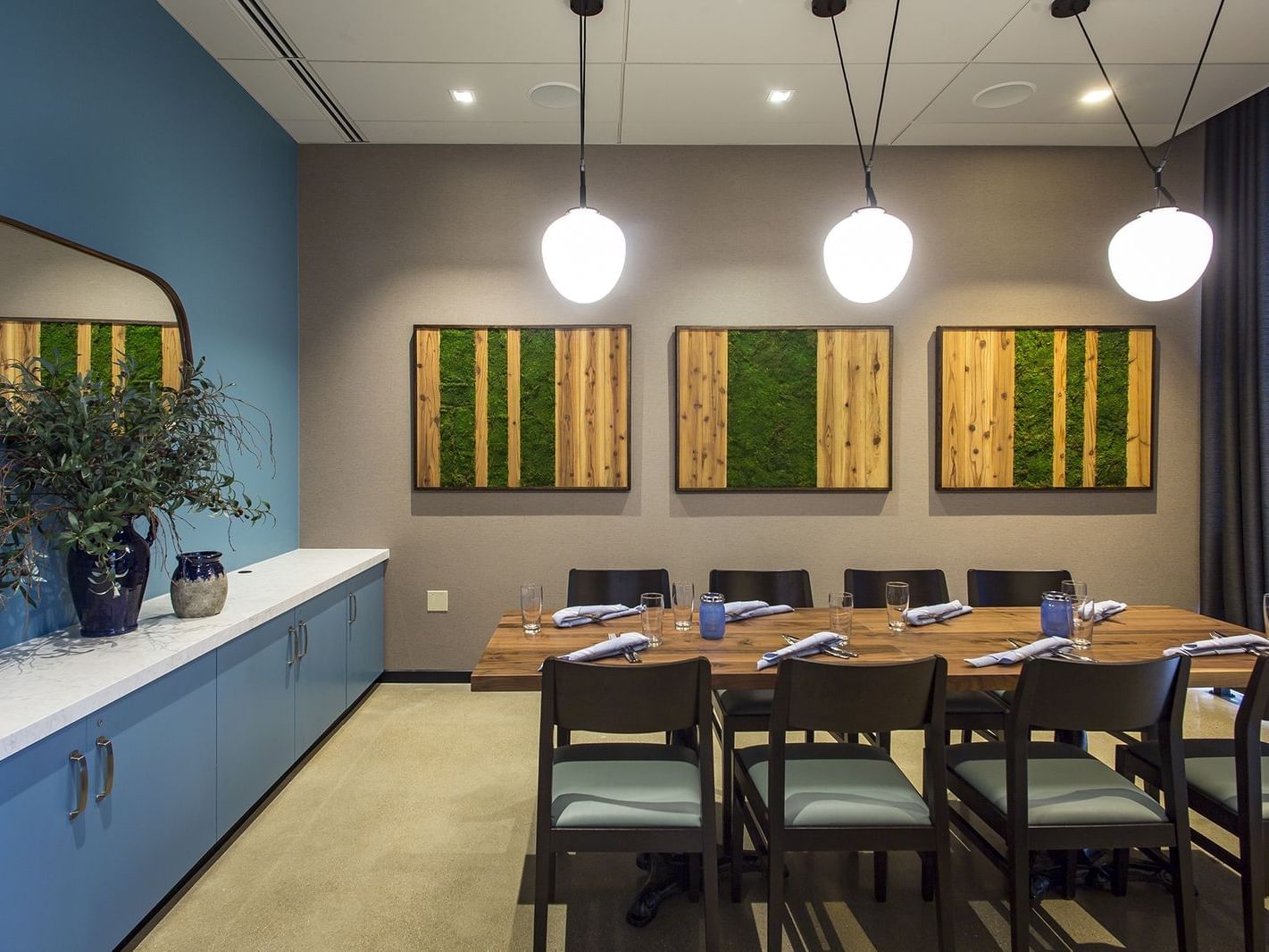 Tuscany Room with dining setup and modern decor at Hotel Arista in Naperville.