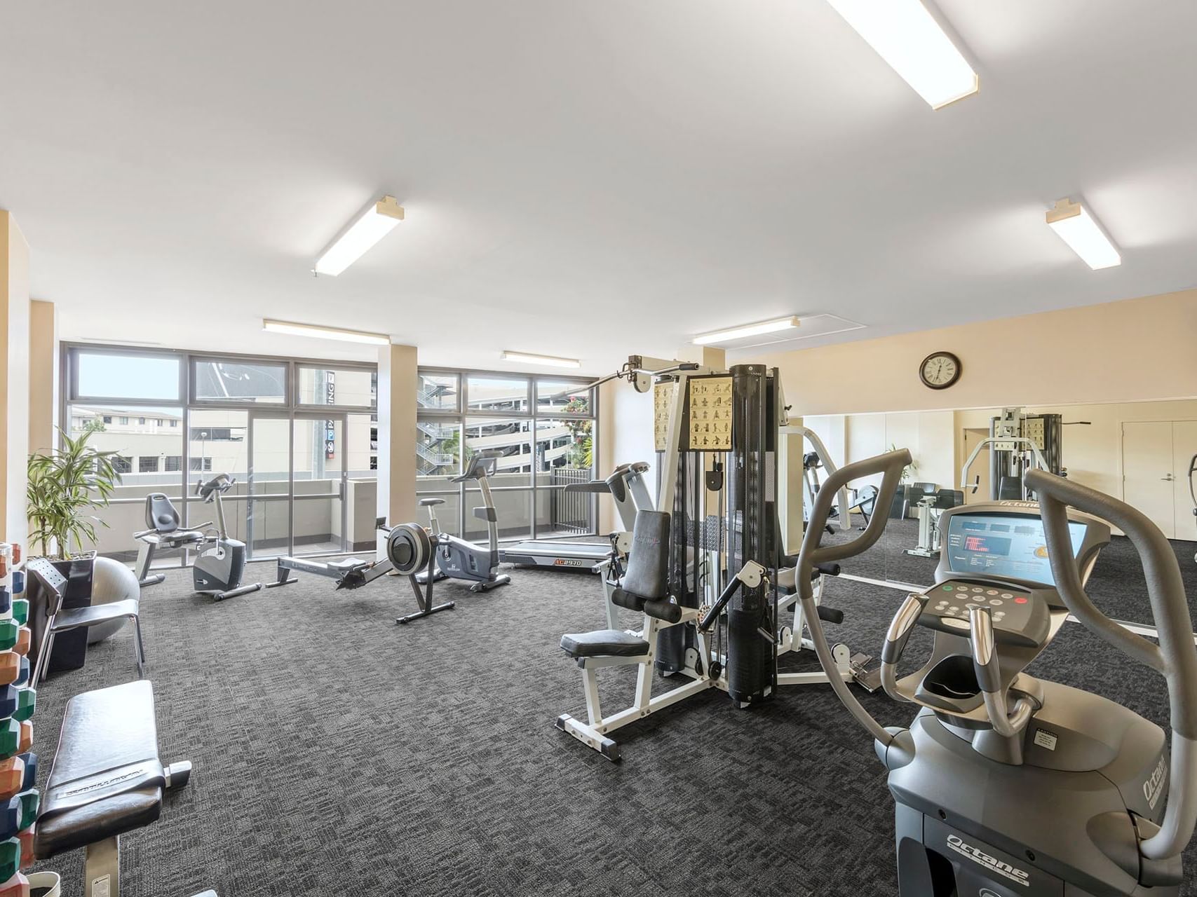 Exercise machines in the fitness center at Hotel Grand Chancellor