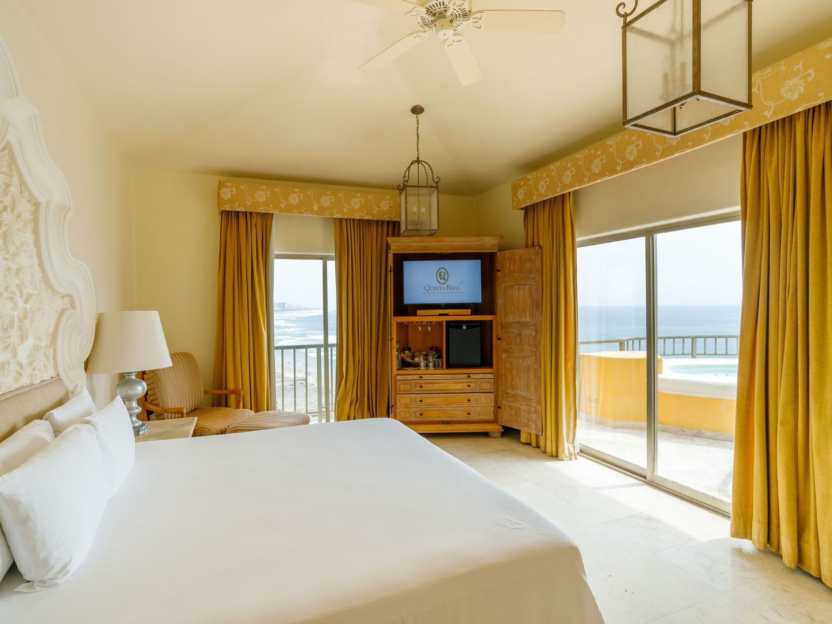 King Governor Suite with a balcony hot tub, ocean panorama, and traditional Mexican decor at Quinta Real Acapulco