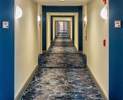 View of The Hallway to Hotel rooms at Bay Club Hotel