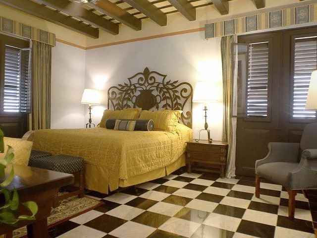 Luxury bed in Gloria Vanderbilt Suite at Hotel El Convento