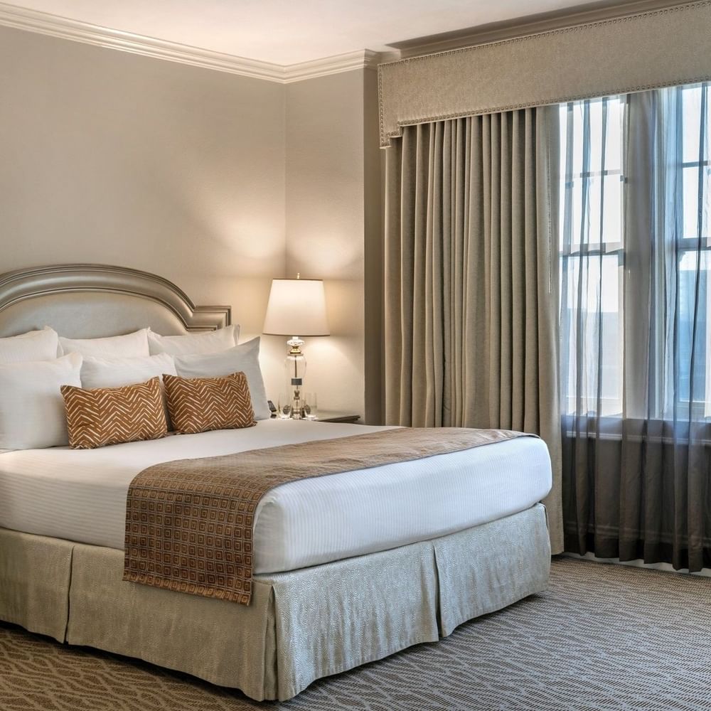 Elegant Classic King room at Warwick Melrose Hotel in Dallas.
