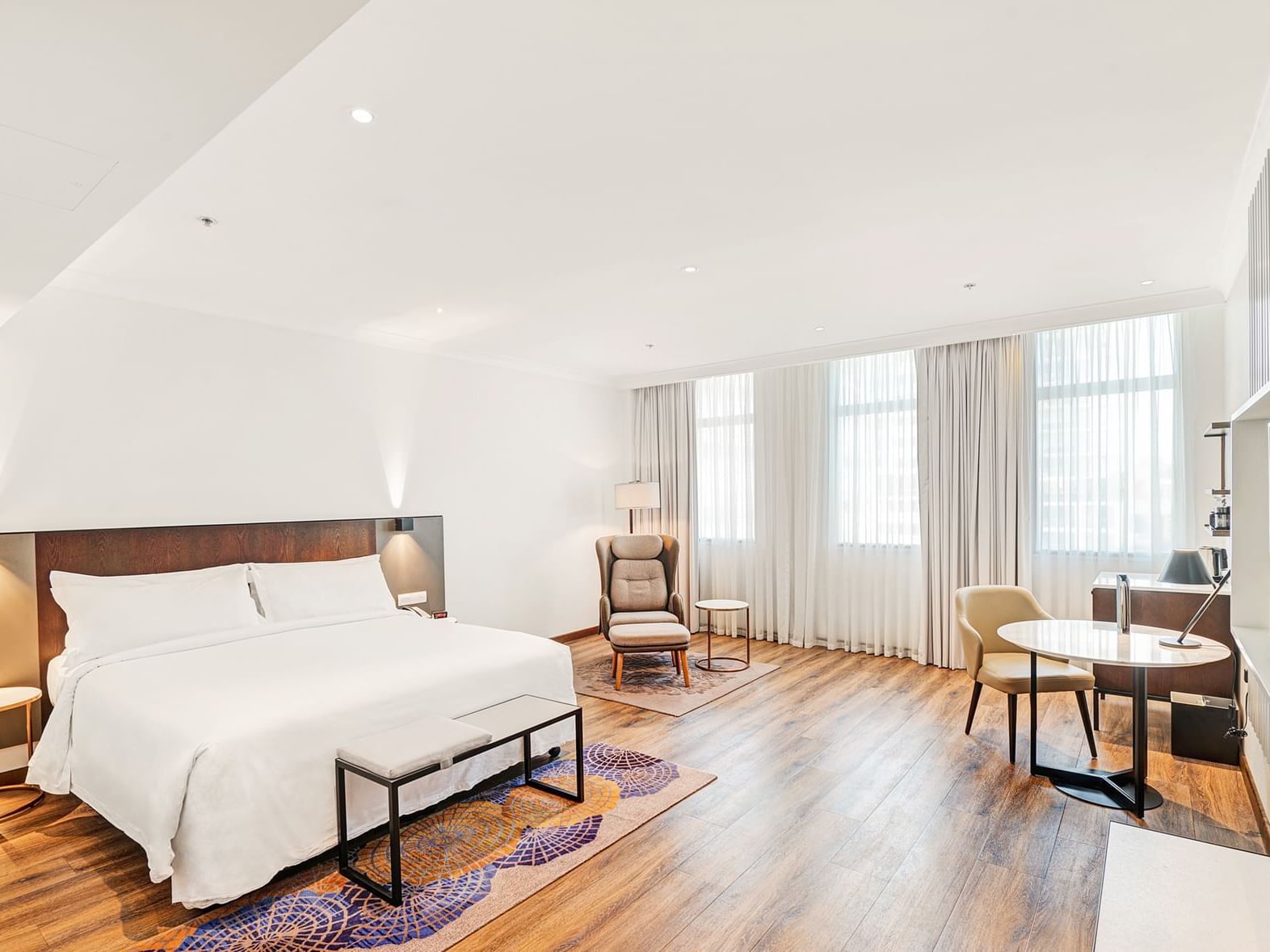 The Signature Deluxe room with king bed at The Grace Sydney