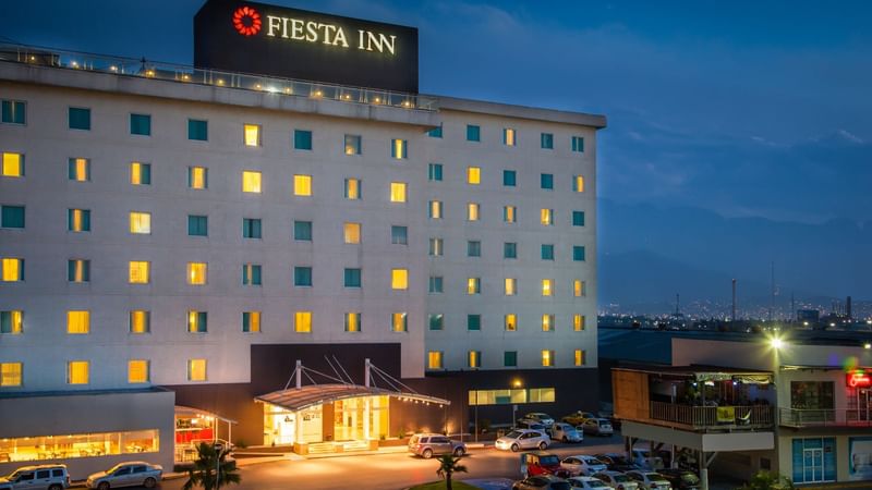 Exterior view of Fiesta Inn Monterrey Fundidora at night