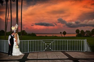 Couple kissing at sunset near Safety Harbor & Resort