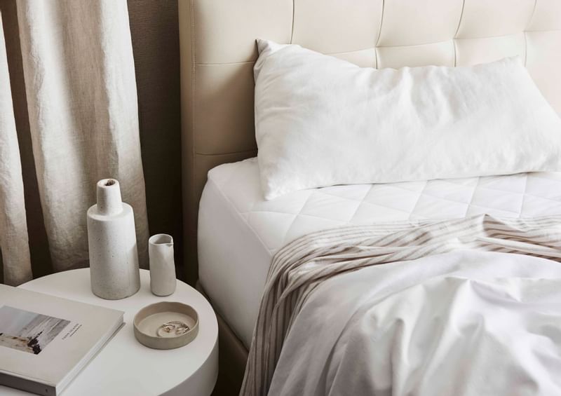 Room with a bed, bedside table at Crown Metropol Melbourne