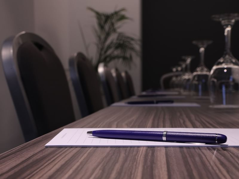 Close-up of pens & notepads arranged on a meeting table at Warwick Palm Beach Hotel - Beirut