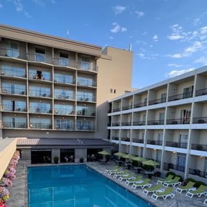 Exterior of Coast Capri Hotel courtyard swimming pool