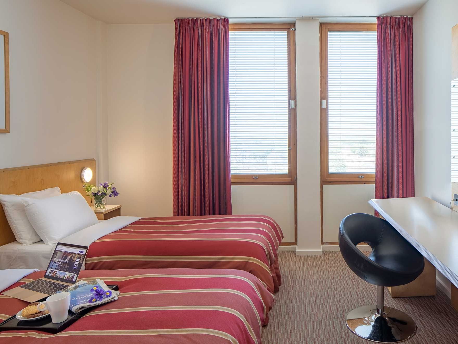 Two beds in Standard Rooms at St. Giles Heathrow Hotel