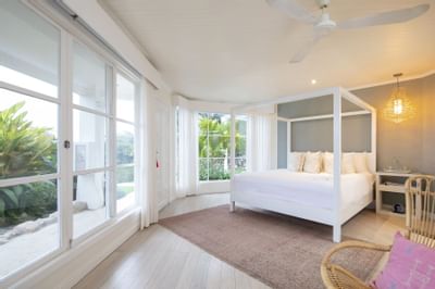 Room with a canopy bed and terrace at Retreat Costa Rica