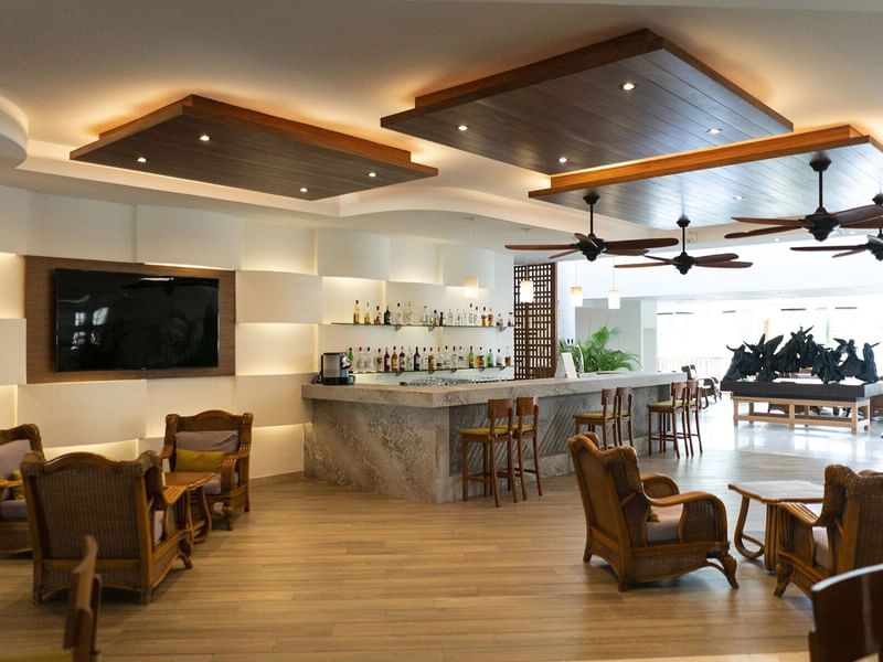 Interior of the bar & lounge area at The Reef Coco Beach