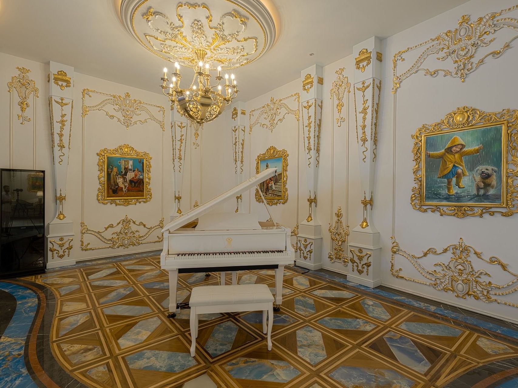 Elegant room with a grand piano and ornate decor at World Heart Hotel Baghdad.