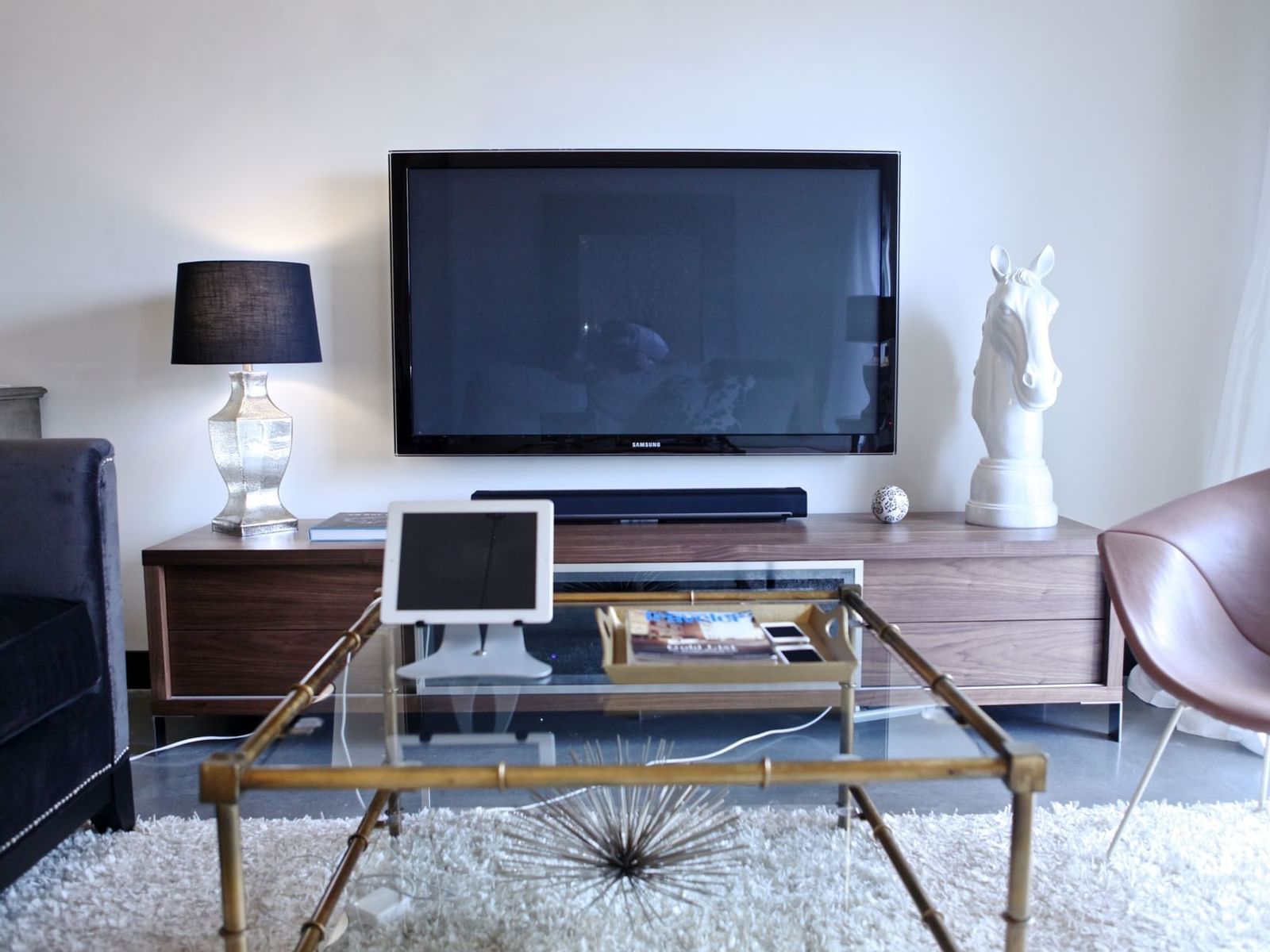TV lounge area in Penthouse Unit T Two Story at The Mayo Hotel