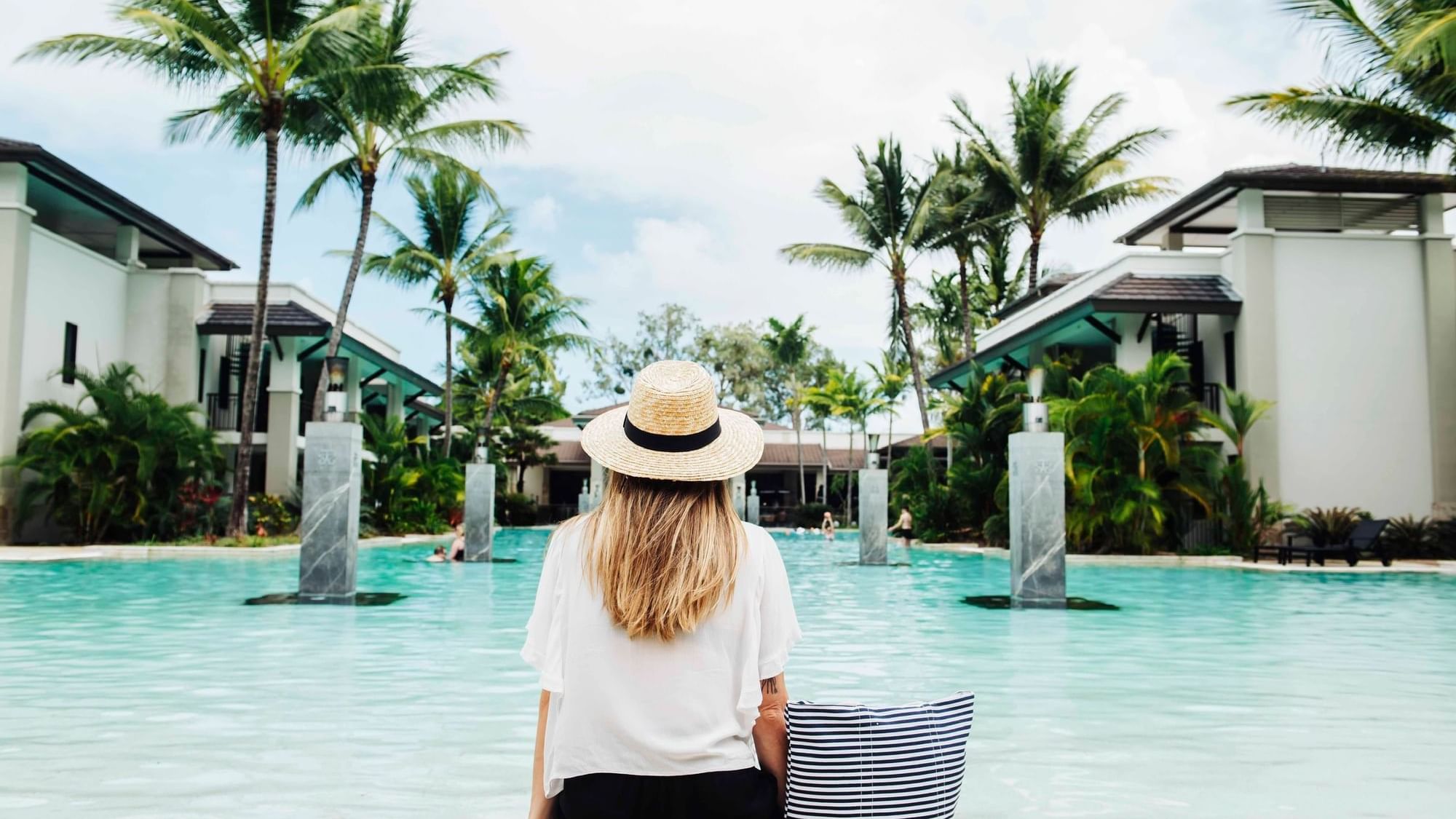 Girl enjoying the pool at Pullman port douglas sea temple resort and spa