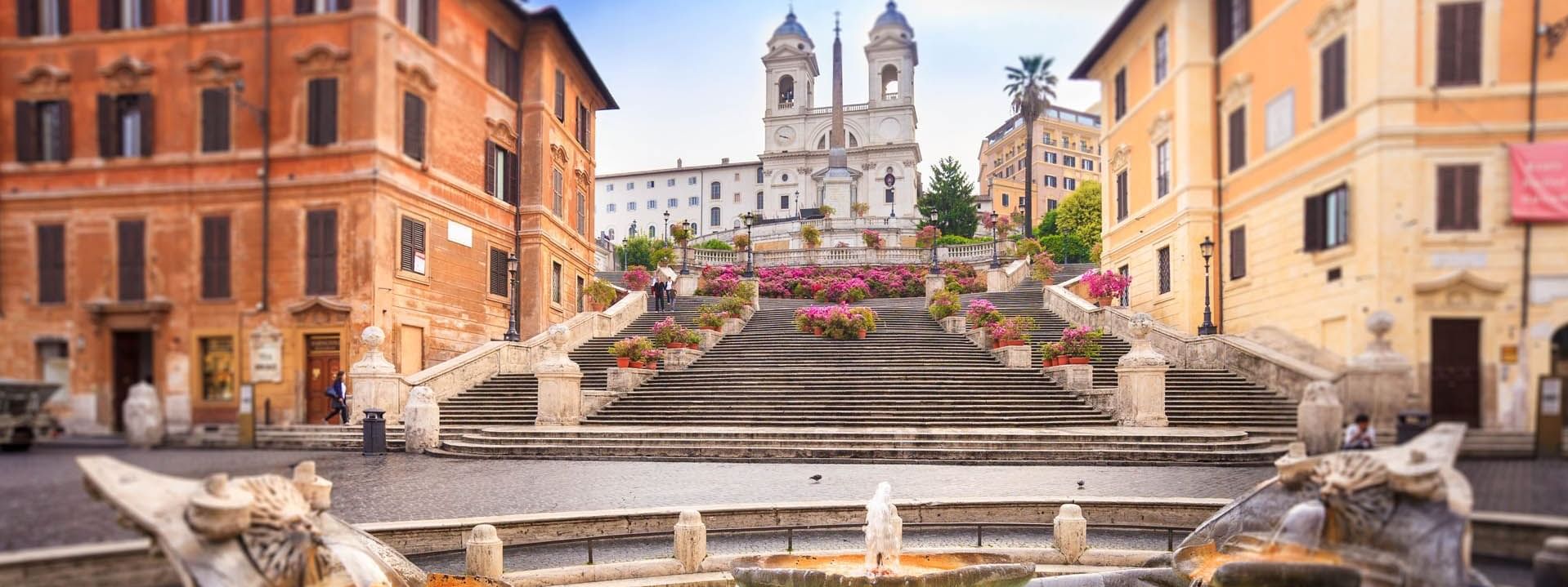 Landscape view of the fountain and aesthetic stairway in Piazza di Spagna near The Style