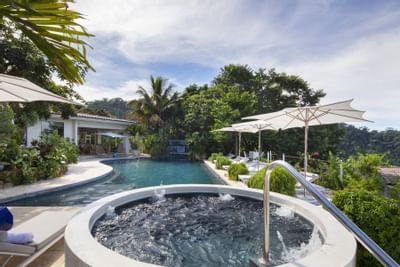 Pool area with a hot tub at Retreat Costa Rica